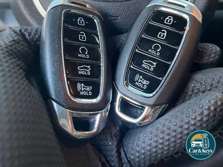 Two Hyundai smart keys paired at the steering wheel