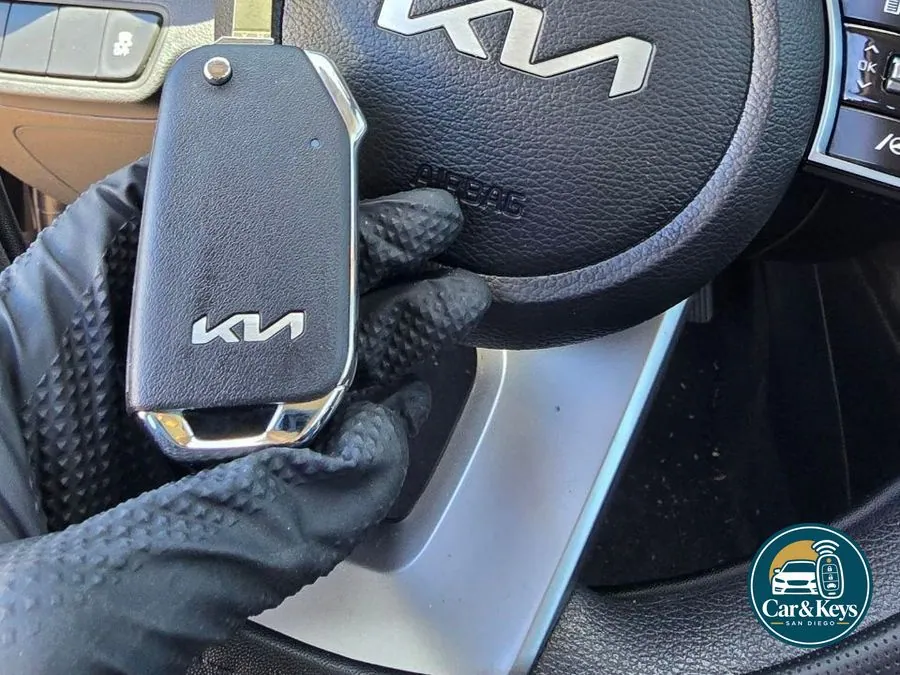 A Kia key programmed at the wheel