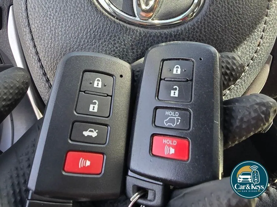 Two Toyota keys, the original and its new spare